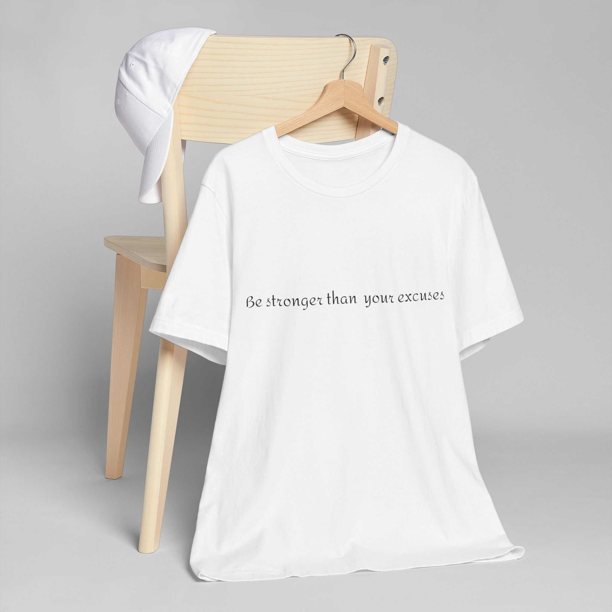 Motivational Tee - "Be Stronger Than Your Excuses" Fitness T-Shirt This lightweight, motivational tee carries a quiet confidence